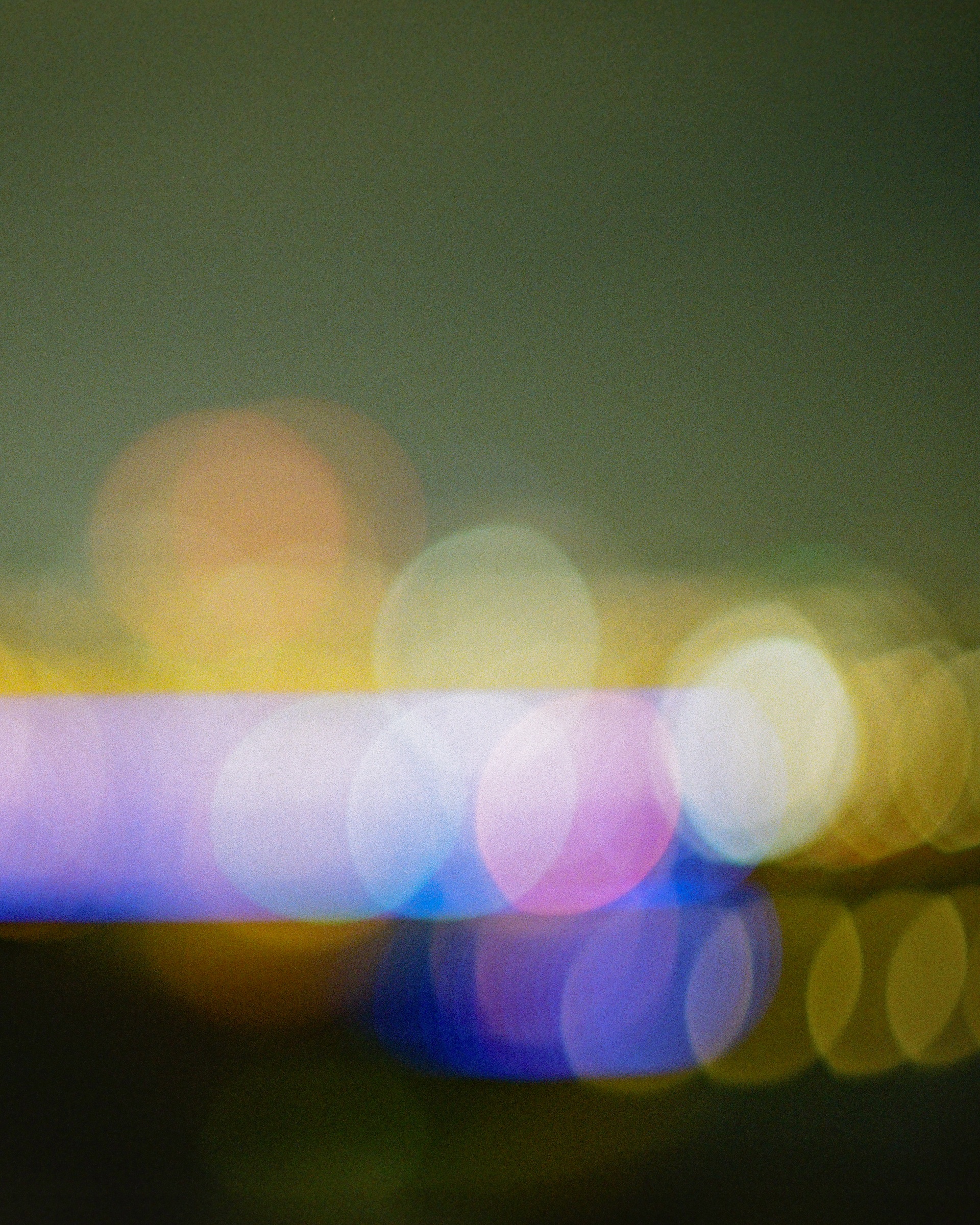 Purple and gold lights out of focus
